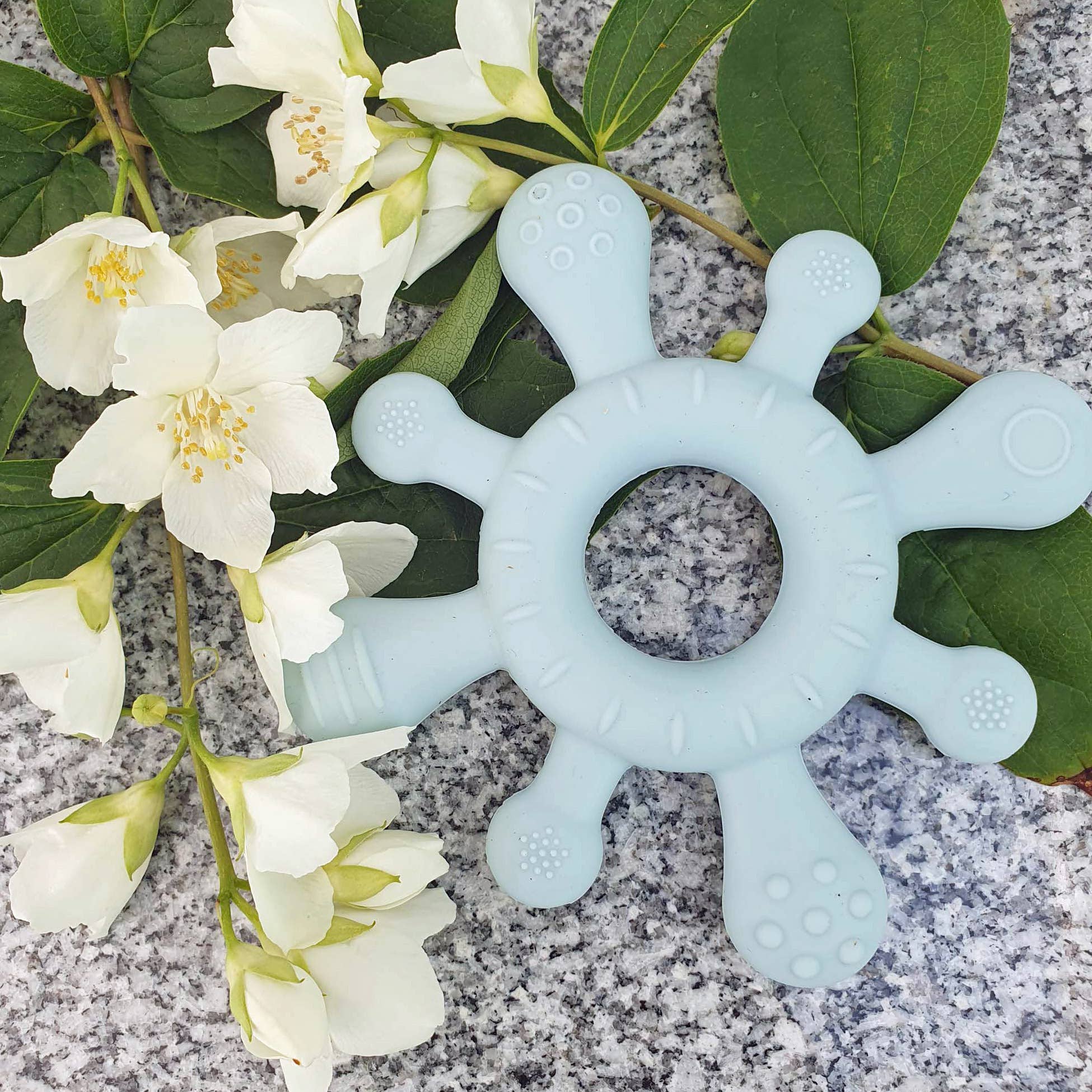 Beißring aus Silikon für Babys, korallenrot