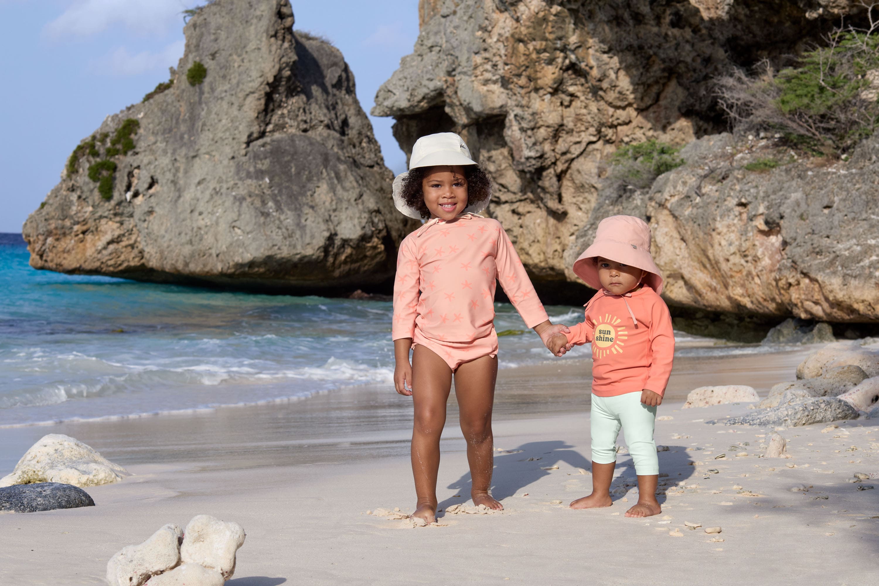 Lässig rosa Schwimmshirt mit Seesternen