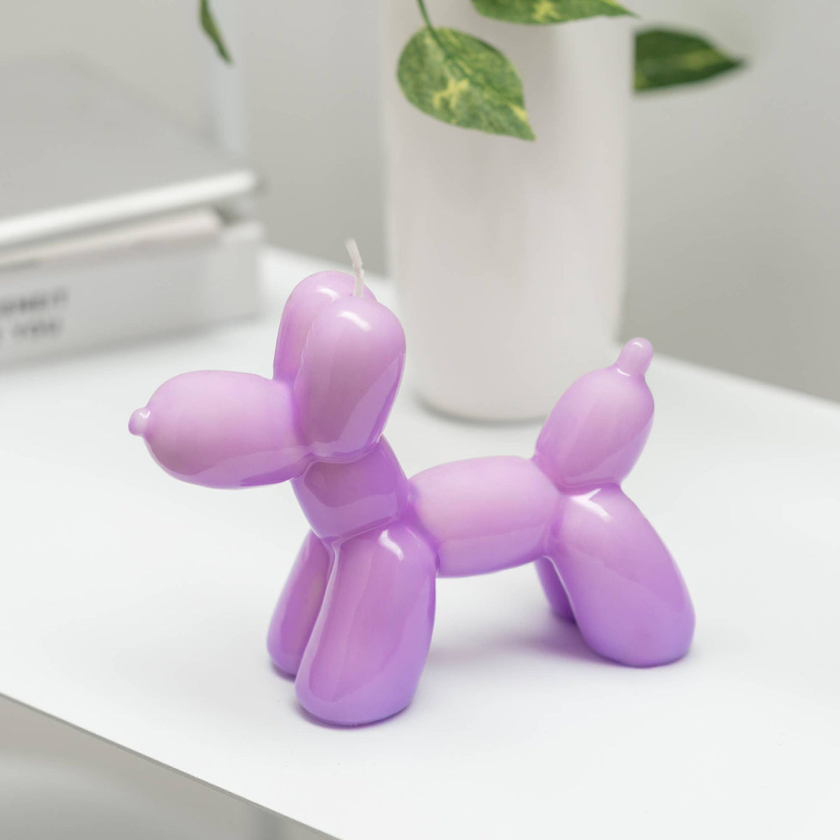 Helio Ferretti BALLONHUND KERZE violett