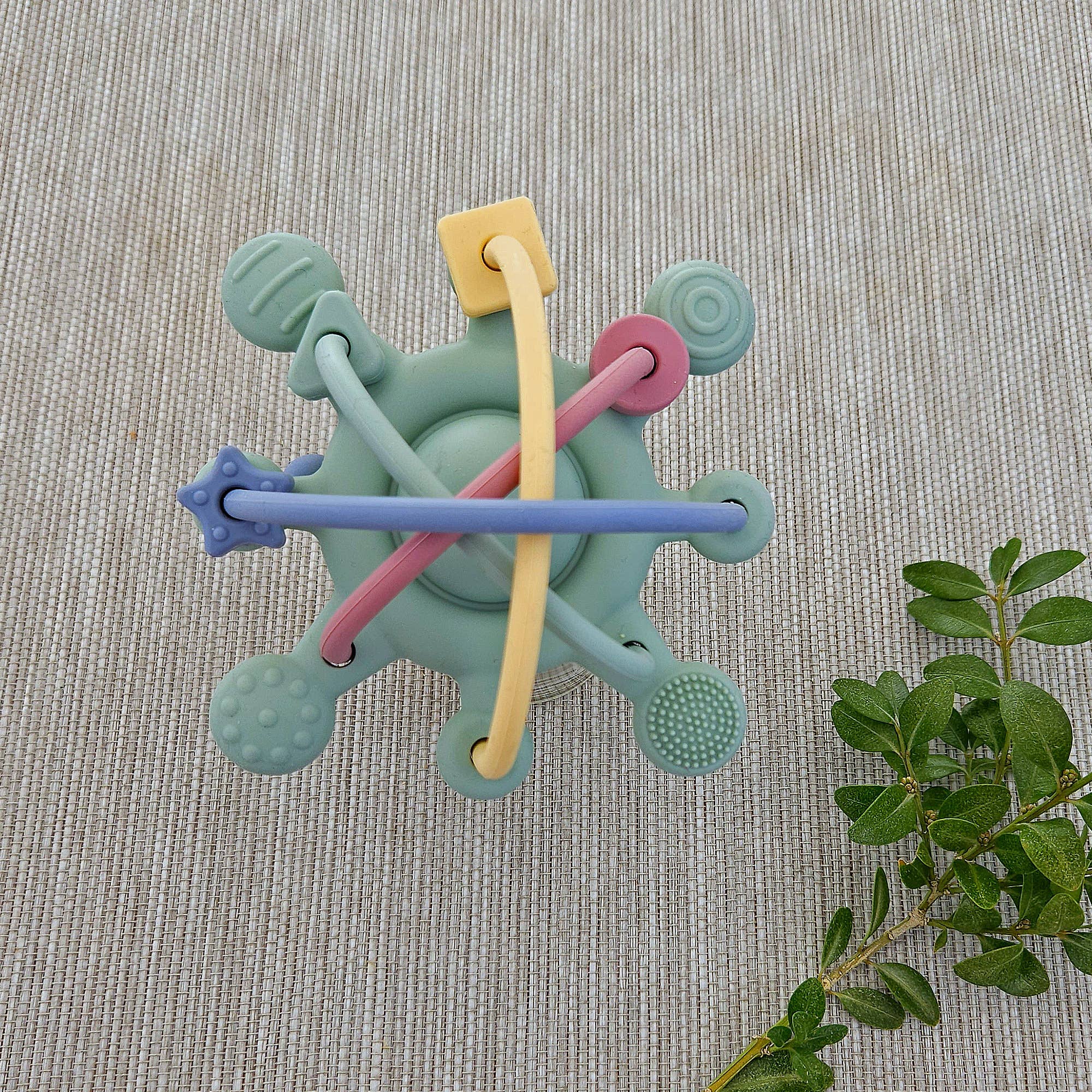 Orbit Baby Silikon-Aktivitätsspielzeug Cameo Green