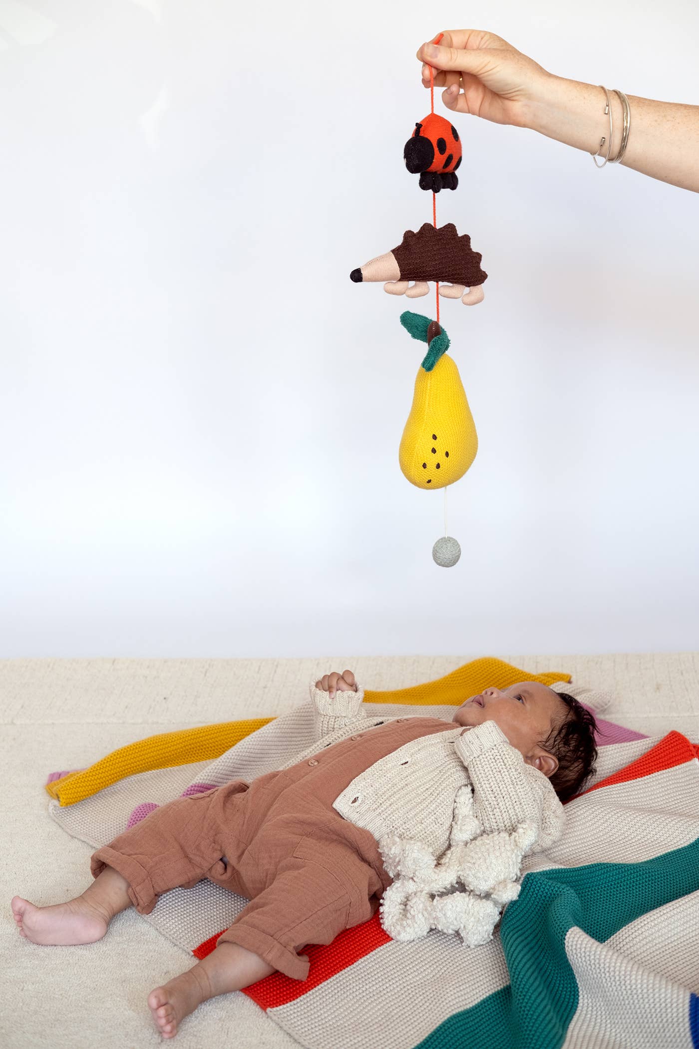 Musikalisches Kinderbett-Mobile: Garten