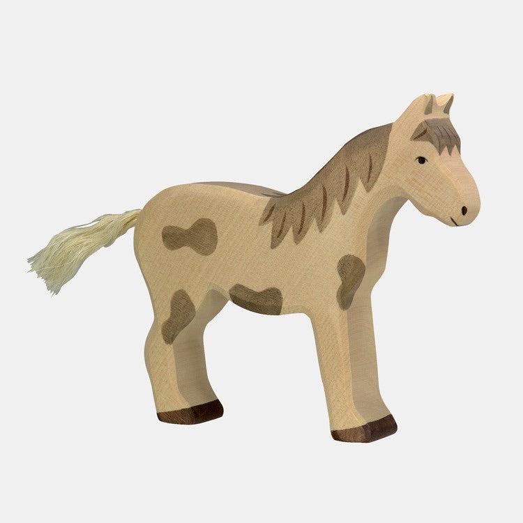 Holztiger Pferd stehend gefleckt